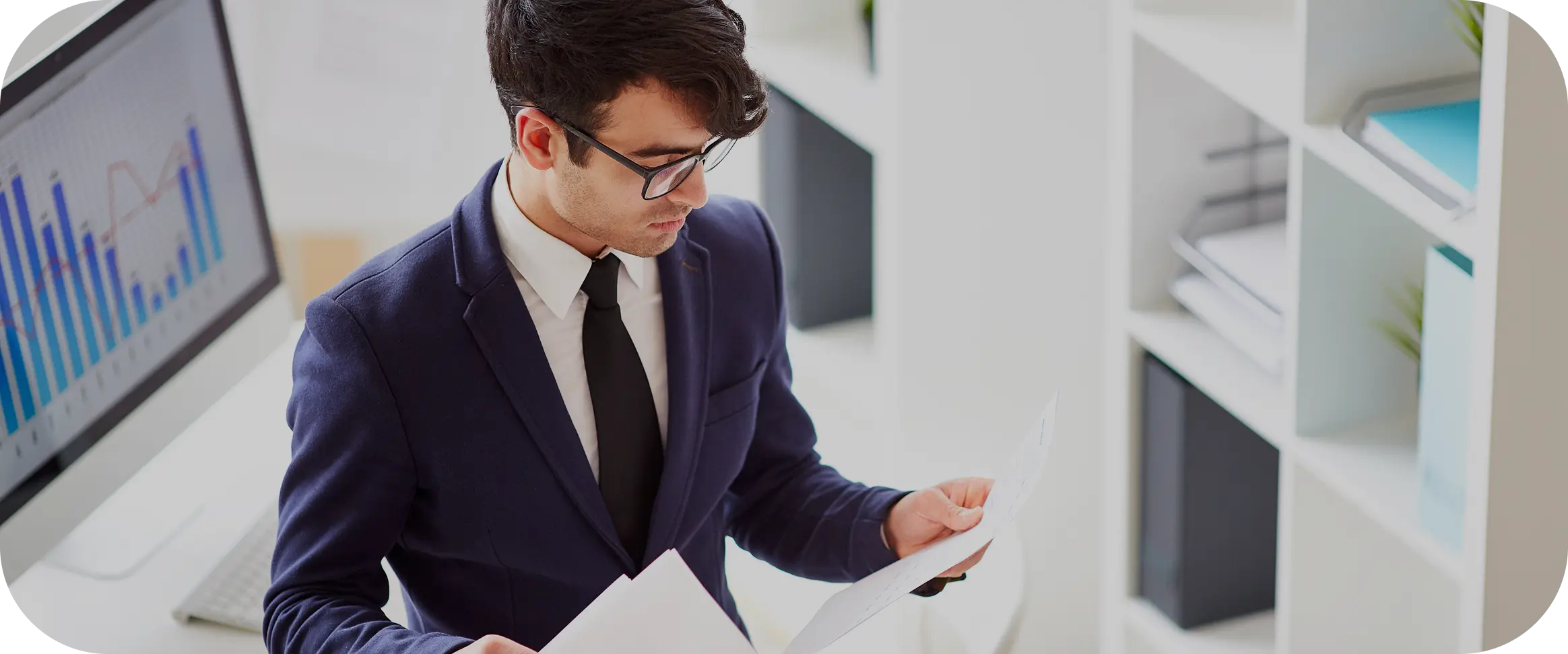 Analyst reviewing charts